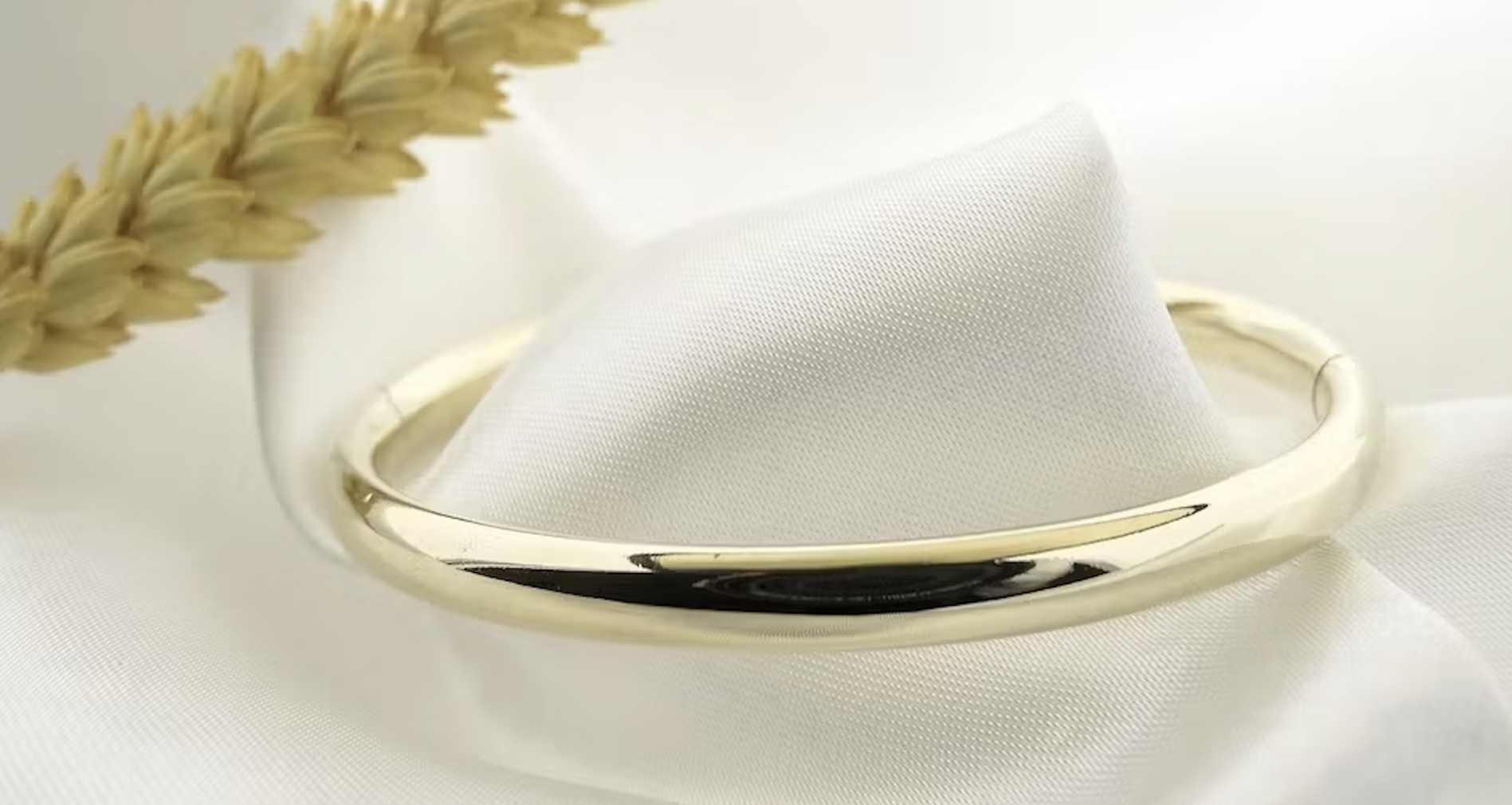 Geelgouden slavenarmband
